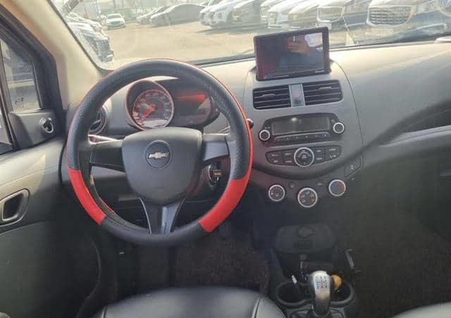 Is the CHEVROLET SPARK 2015 fuel-efficient for urban driving in Uganda?