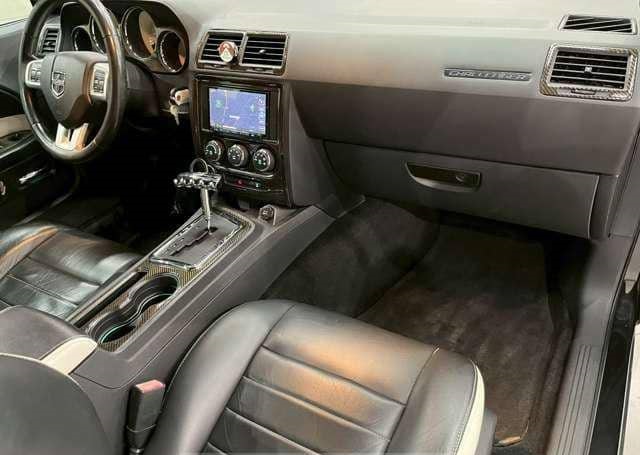 Is the DODGE CHALLENGER SXT 2011 fuel efficient for daily driving in Uganda?