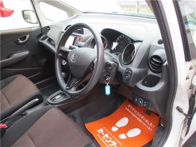 Is the HONDA FIT SHUTTLE 2013 fuel-efficient for Ugandan roads?