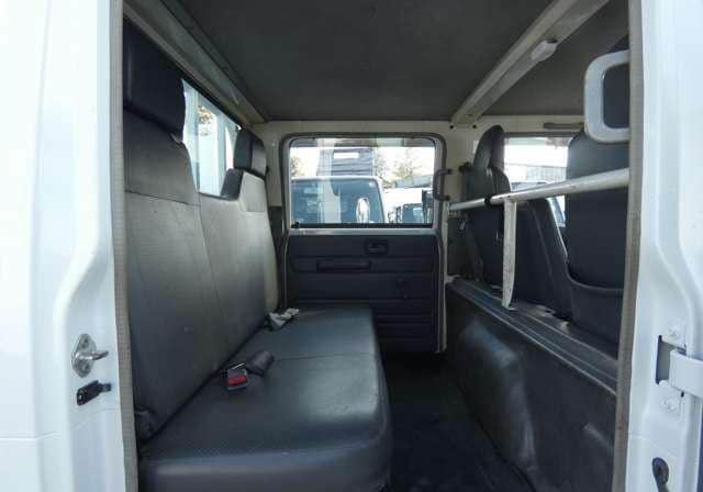 Is the ISUZU ELF TRUCK 1.5W251127 2010 suitable for long-distance transportation in Uganda?
