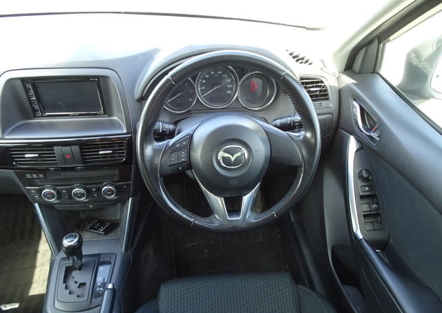 Is the MAZDA CX-5 2013 fuel efficient for Ugandan roads?