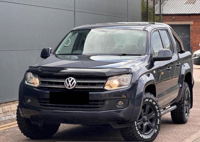 Is the VOLKSWAGEN AMAROK MANUAL DIESEL 2 2011 fuel-efficient for long-distance driving?